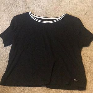 A cropped black holister shirt